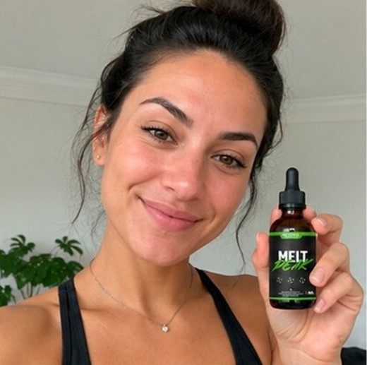 MeltPeakDrop customer holding a bottle, photo 1