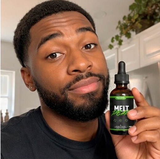 MeltPeakDrop customer holding a bottle, photo 4